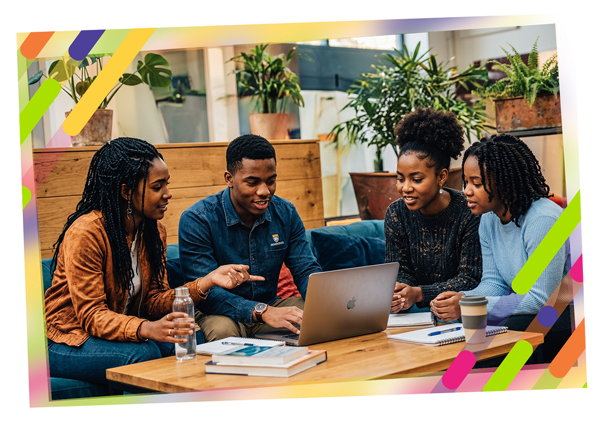 Students studying together in a Jezreel student residence common area